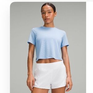 Light Blue Lululemon ultralight weight length t-shirt size 4